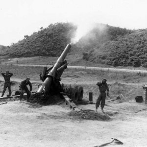 An 8 inch towed Howitzer firing