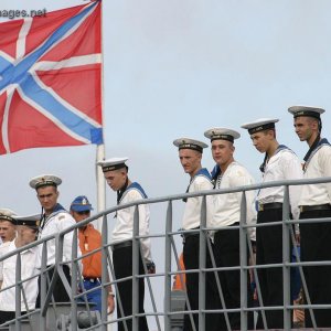 Sailors aboard Marshal Shaposhnikov man the rails