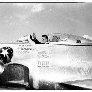 USAF Lt. Walter Rew waves to the crowd after winning the Allison air-race trophy 1949