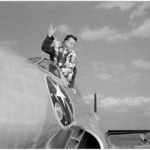 USAF Lt. Walter Rew waves to the crowd from his Lockheed F-80C Shooting Star after winning the Allison air-race trophy 1949
