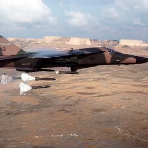 General Dynamics F-111A Aardvark releasing Mk 82 bombs