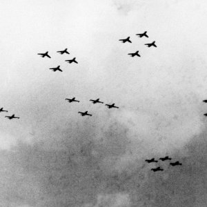 Twelve USAF North American F-86A Sabre fighters and twelve Lockheed F-80C Shooting Star fighters over Korea, on 1 June 1951.
