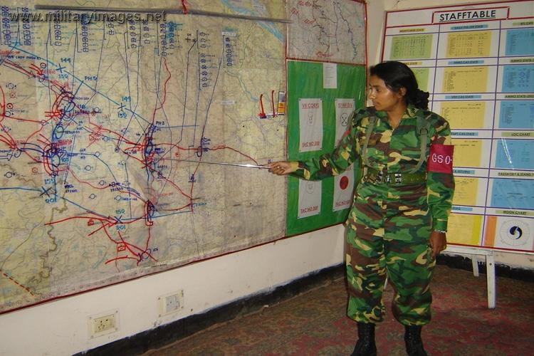 Lady Officer in a Command Post Briefing