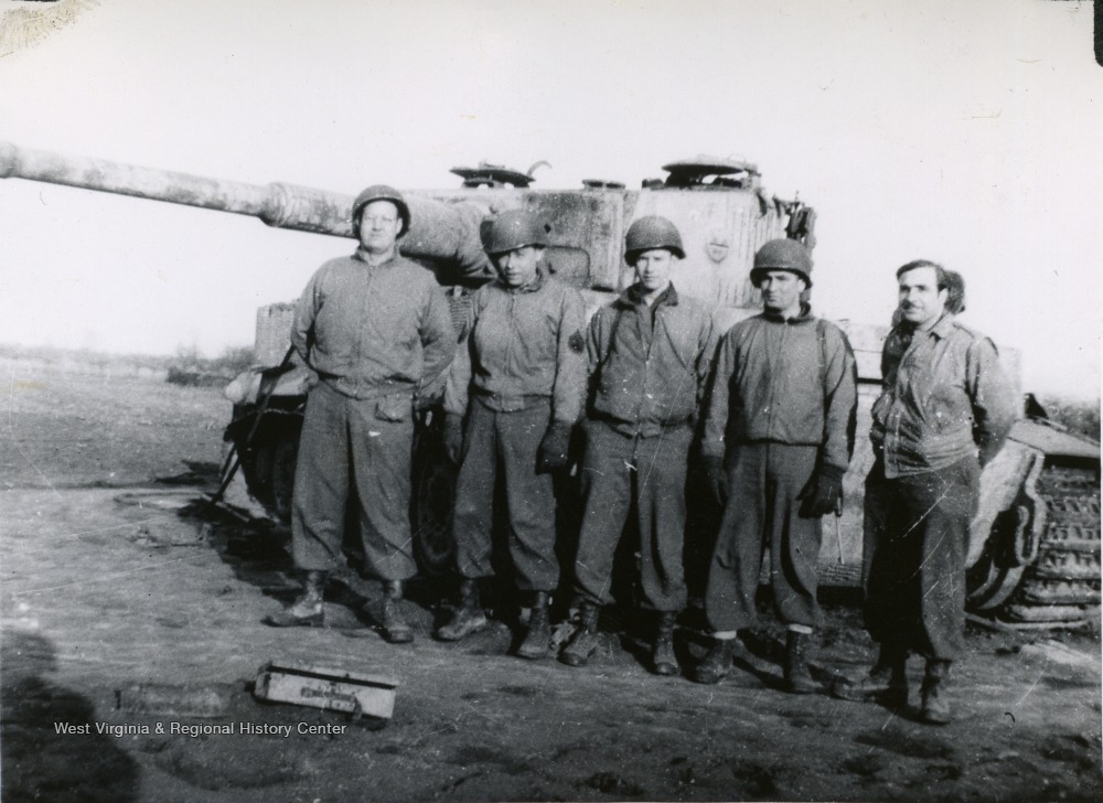 83rd Inf Div soldiers pose with German Tank.jpg
