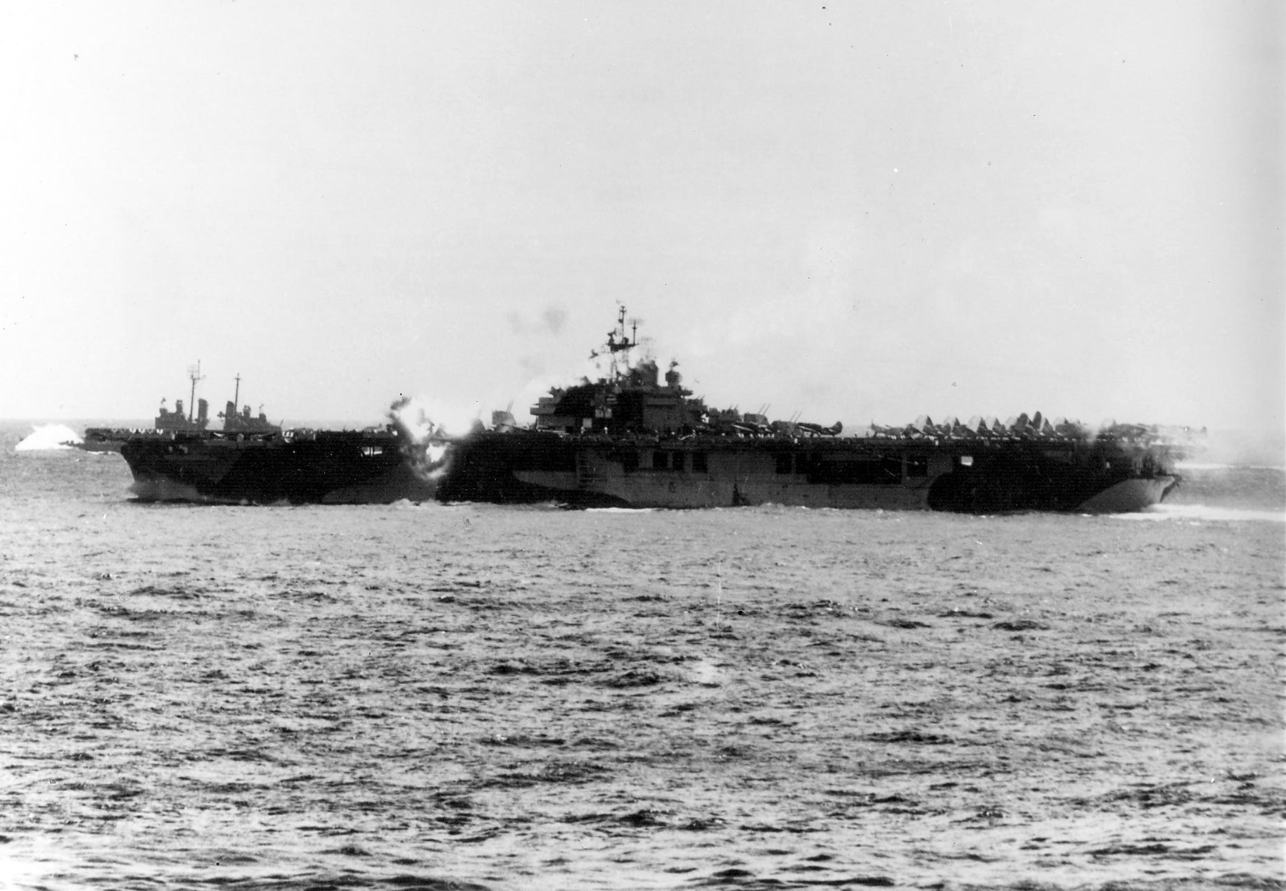 A kamikaze hits the carrier Essex (CV 9) operating off the Philippine Islands. 11-25-44.jpg