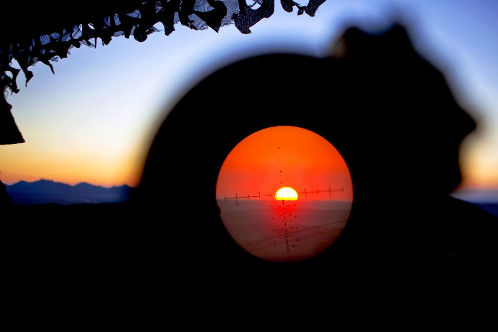 A view from Observation Post Athens in Helmand province, Afghanistan, as the sun sets Nov. 28,...jpg