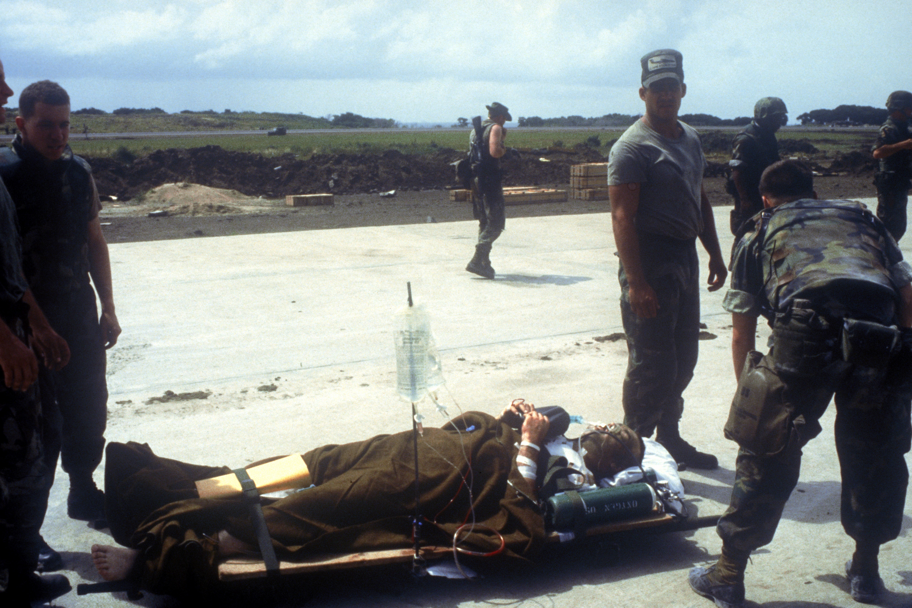 a-wounded-soldier-is-evacuated-from-the-island-during-operation-urgent-fury-1d5821.jpg