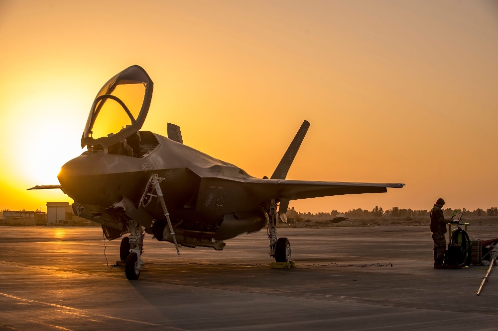 an_f-35a_parked_in_front_of_the_sunset.jpg