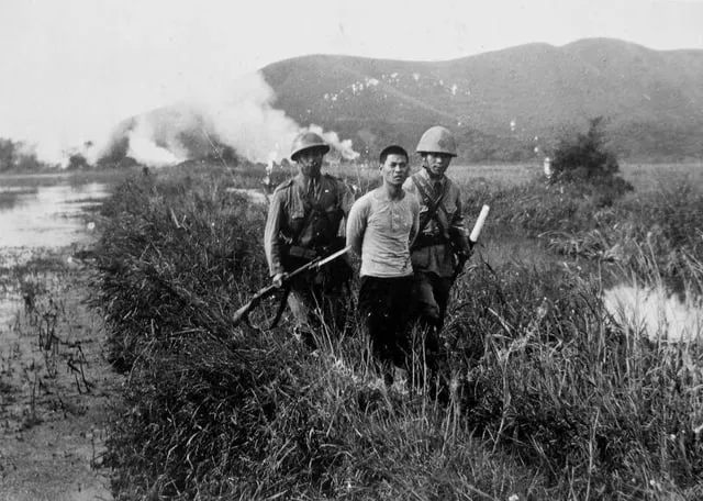 cer-and-soldier-escort-a-captured-v0-q30z88ae8tcf1.webp
