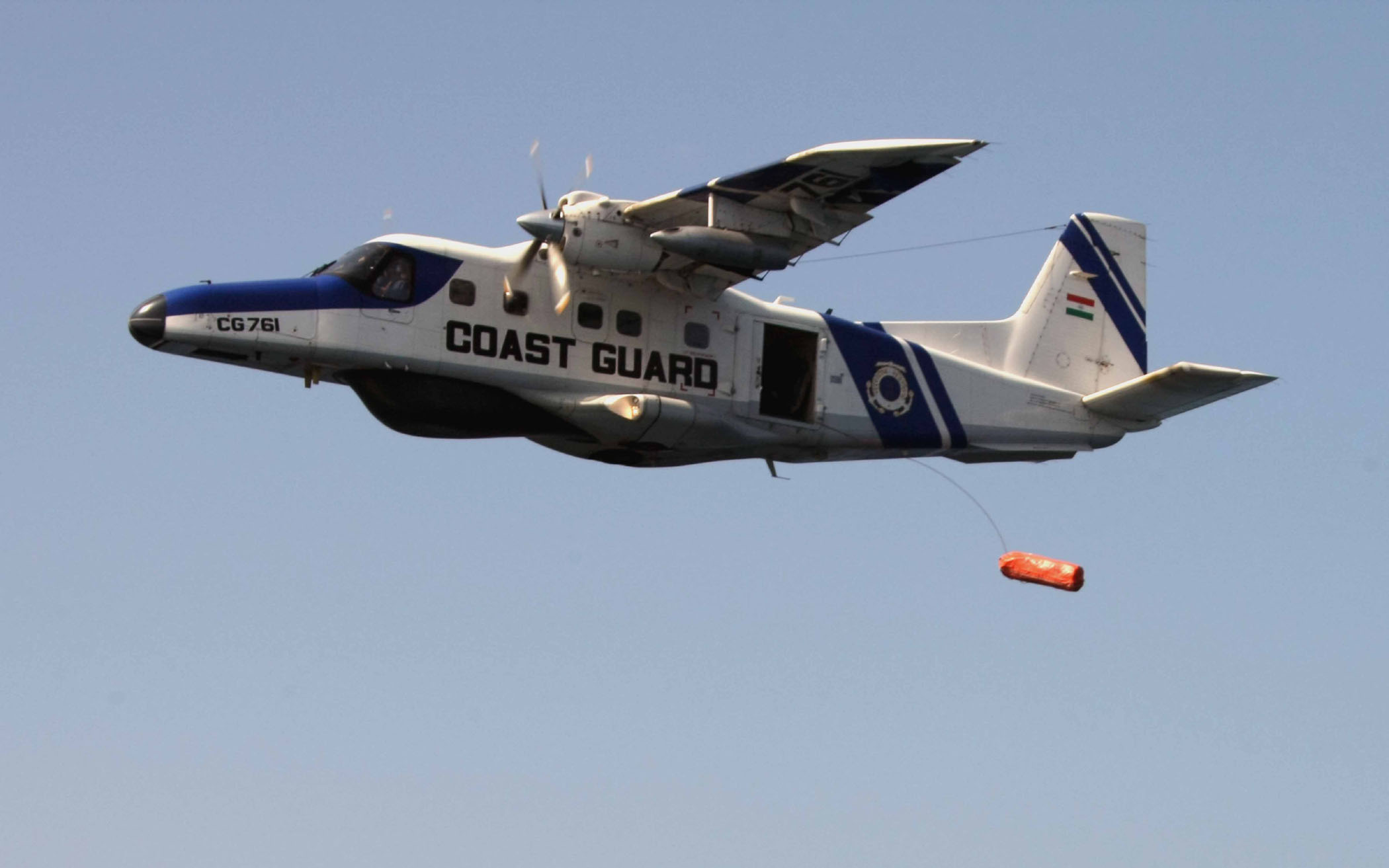 Dornier_Do-228_of_the_Indian_Coast_Guard_dropping_a_life_raft.jpg