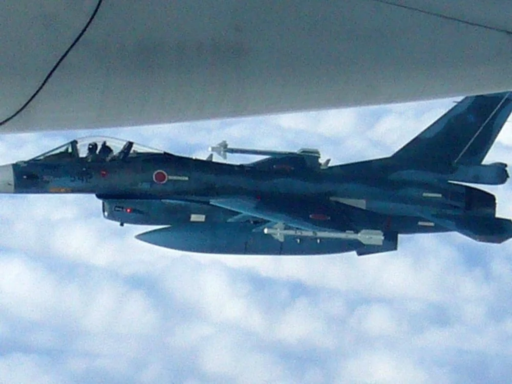 F-2+Tu-214R+Flankers.webp
