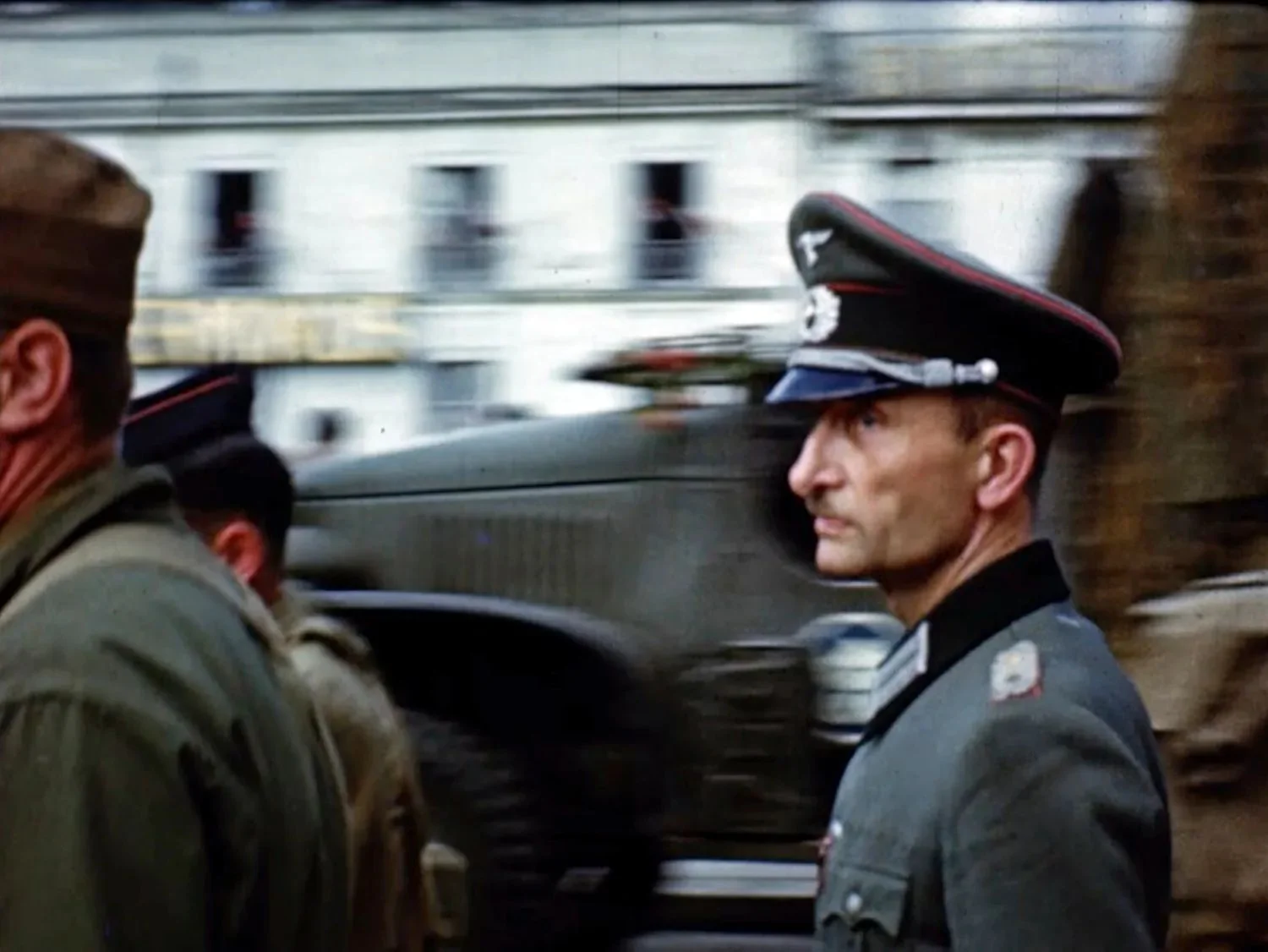 German officer is escorted by U.S. soldiers after the liberation of Paris in 1944..webp
