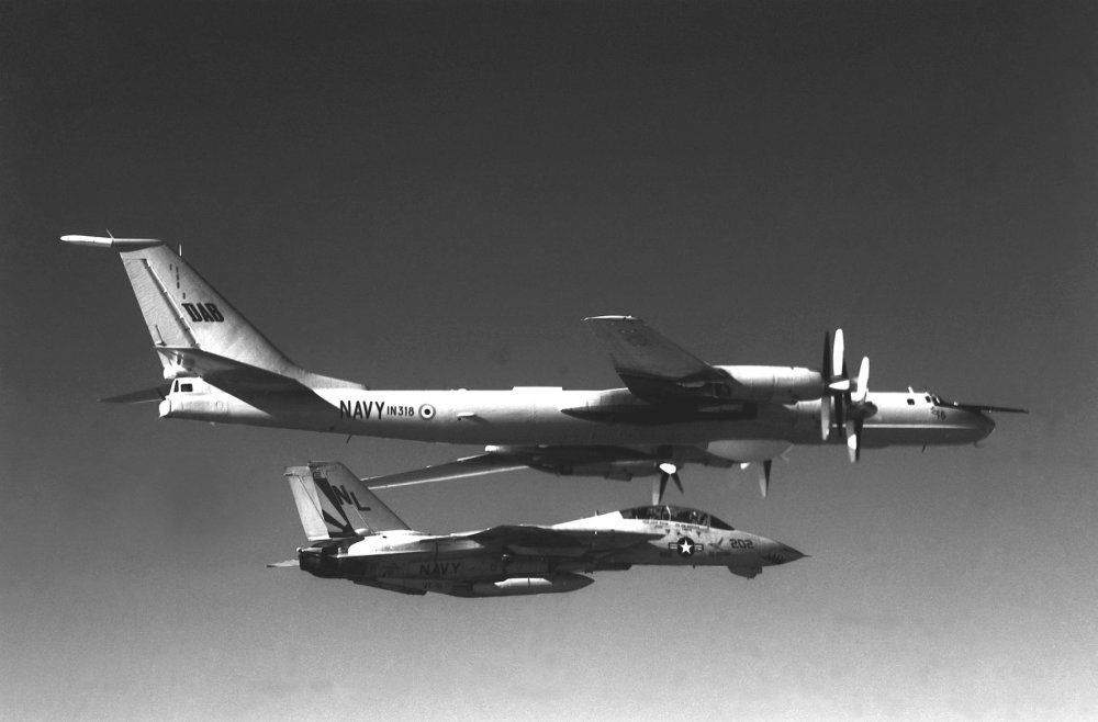 Indian Tu-142 (IN318) intercepted by US Navy F-14.jpg