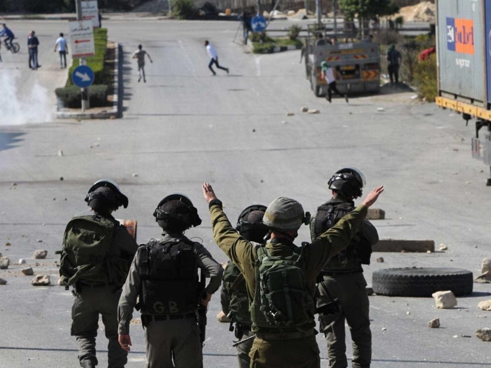israeli-soldiers-idf-palestinian-protesters-afp.jpg