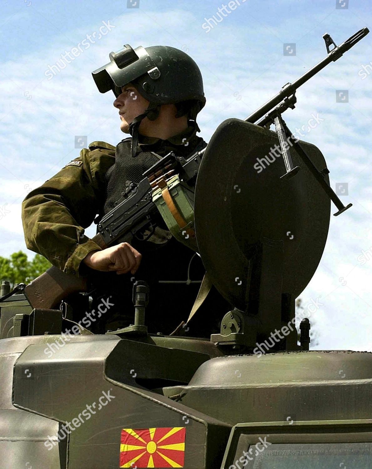 macedonia-policeman-with-machinegun-may-2001-shutterstock-editorial-8482158b.jpg