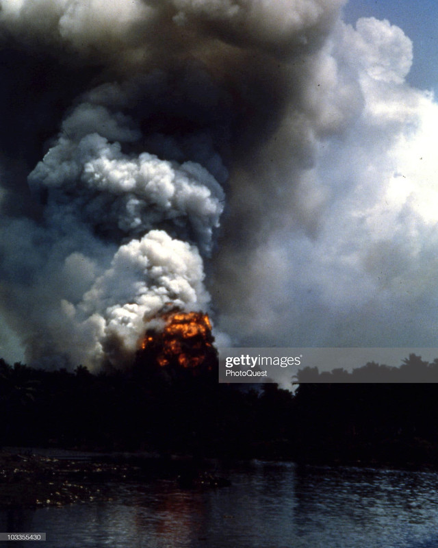 mmunition-depot-burns-on-the-island-of-Guadalcanal.jpg