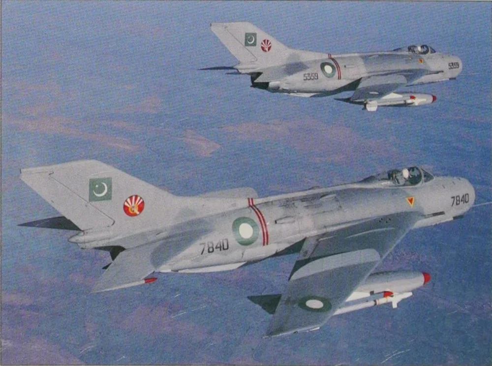 Pakistani F-6C (7840 & 5359) inflight.webp