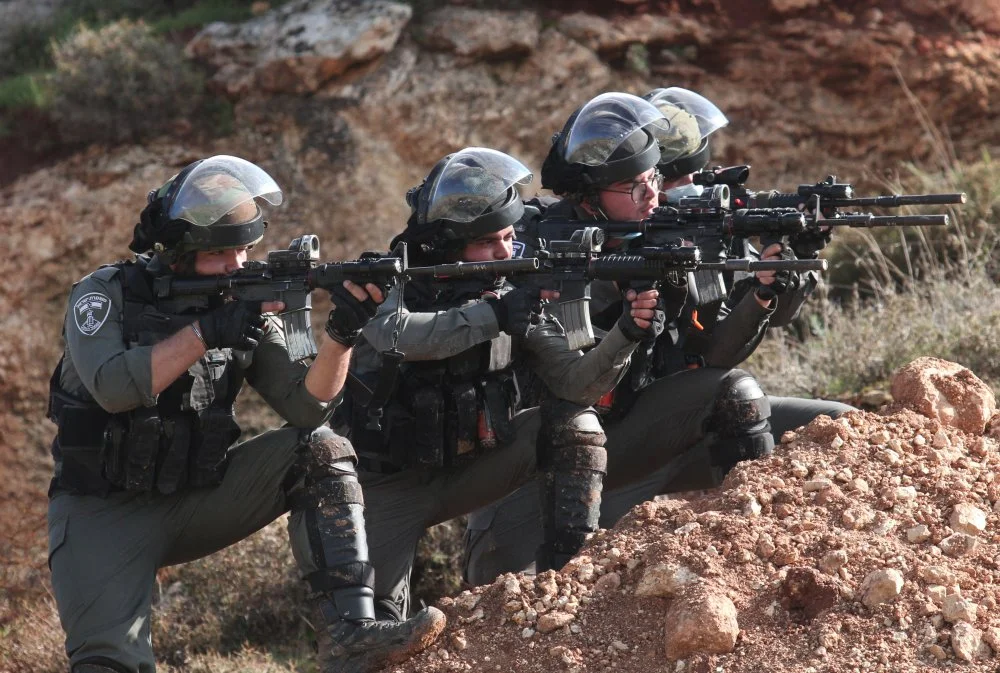 Palestine-Israeli-soldiers-fire-at-Palestinian-demostrators-protesting-illegal-Israeli-settle...webp