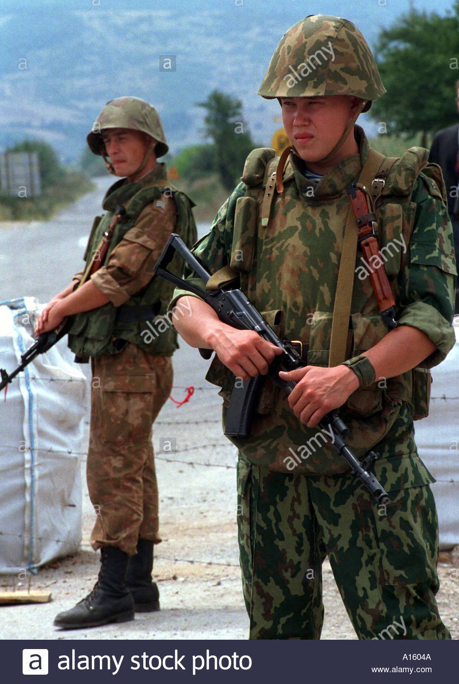 Russian soldiers guard a checkpoint near the village of Pasjane in Kosovo Sunday August 1 99.jpg