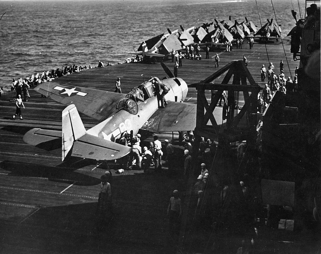 TBF Avenger, with Torpedo Squadron Fifteen (VT-15), sitting on deck of USS Essex (CV-9) being ...jpg