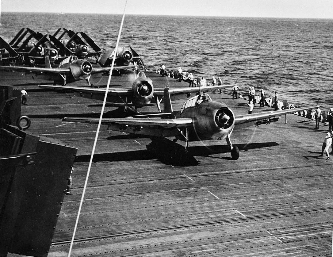 TBF Avengers, with Torpedo Squadron Fifteen (VT-15), on deck of USS Essex (CV-9) preparing for...jpg