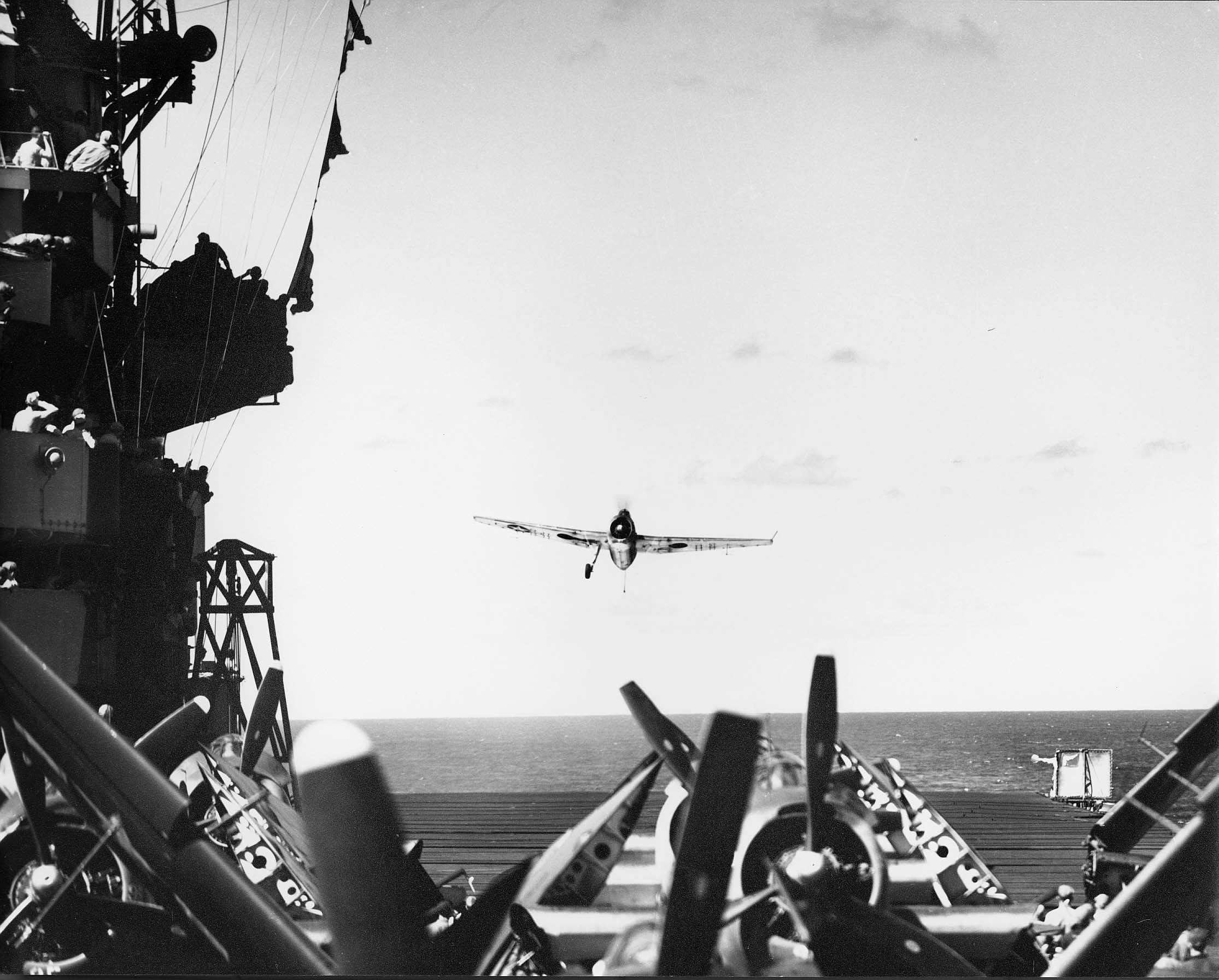 TBM-3 Avenger, with Torpedo Squadron Eighty-Three (VT-83), approaching CV-9 (USS Essex) for a ...jpg