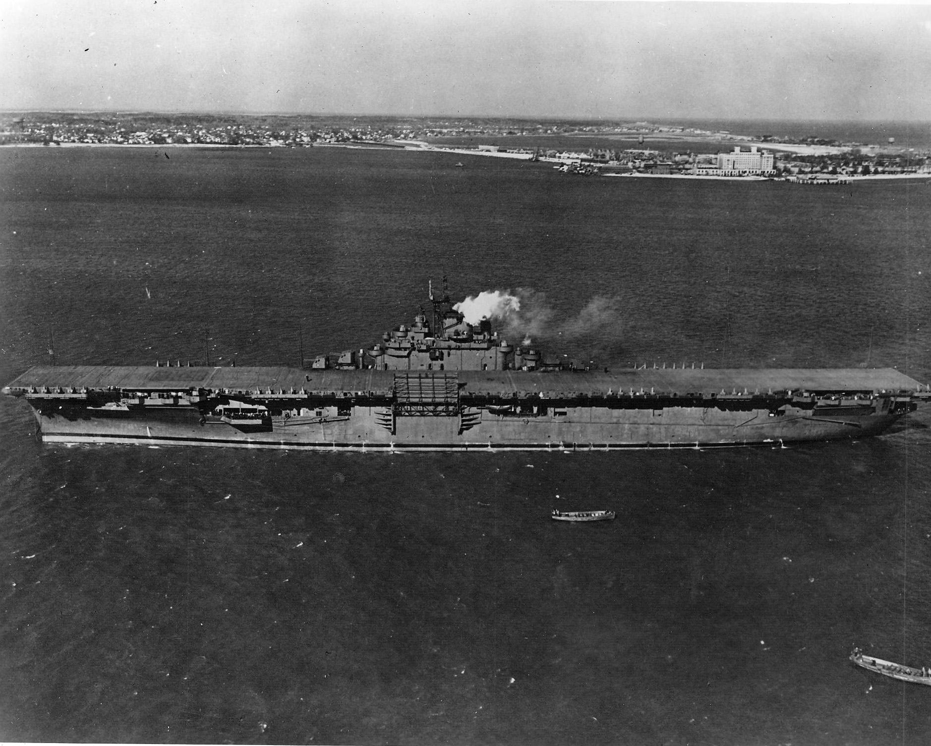 The carrier Essex (CV 9) at anchor at Hampton Roads, Virginia, shortly after her commissioning...jpg