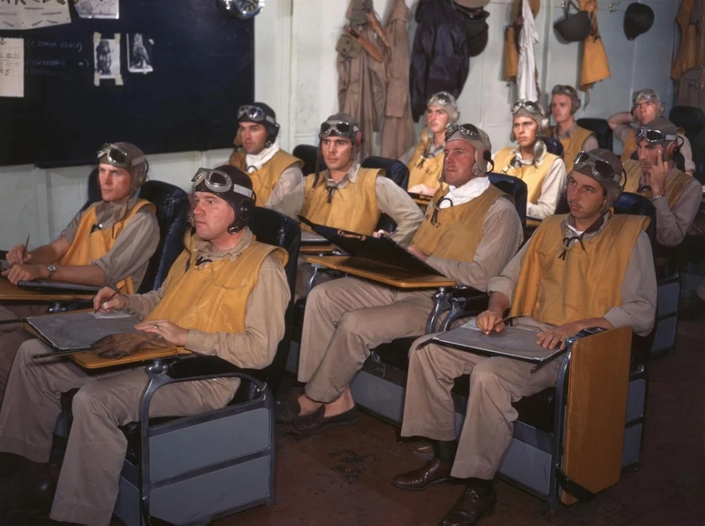 ts-assembled-for-a-briefing-on-board-USS-Lexington.webp