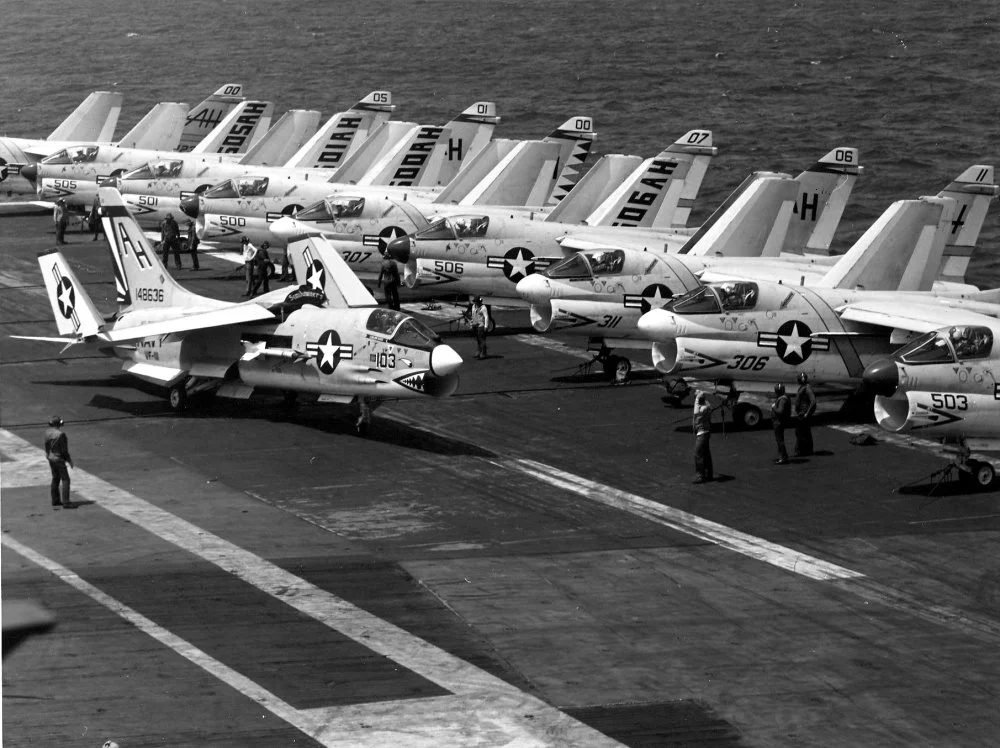 US Navy F-8H (148636) of VF-111 & A-7B of VA-87 & VA-25 on Ticonderoga off Vietnam (February t...jpg