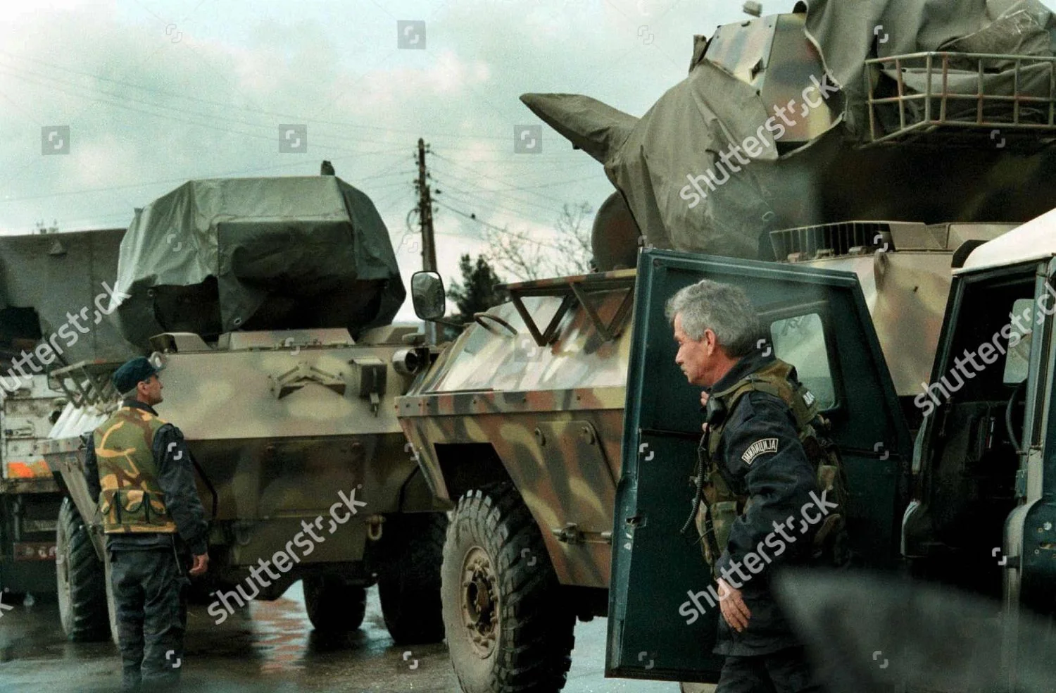 yugoslavia-kosovo-serb-militia-convoy-mar-1999-shutterstock-editorial-8350801a.jpg