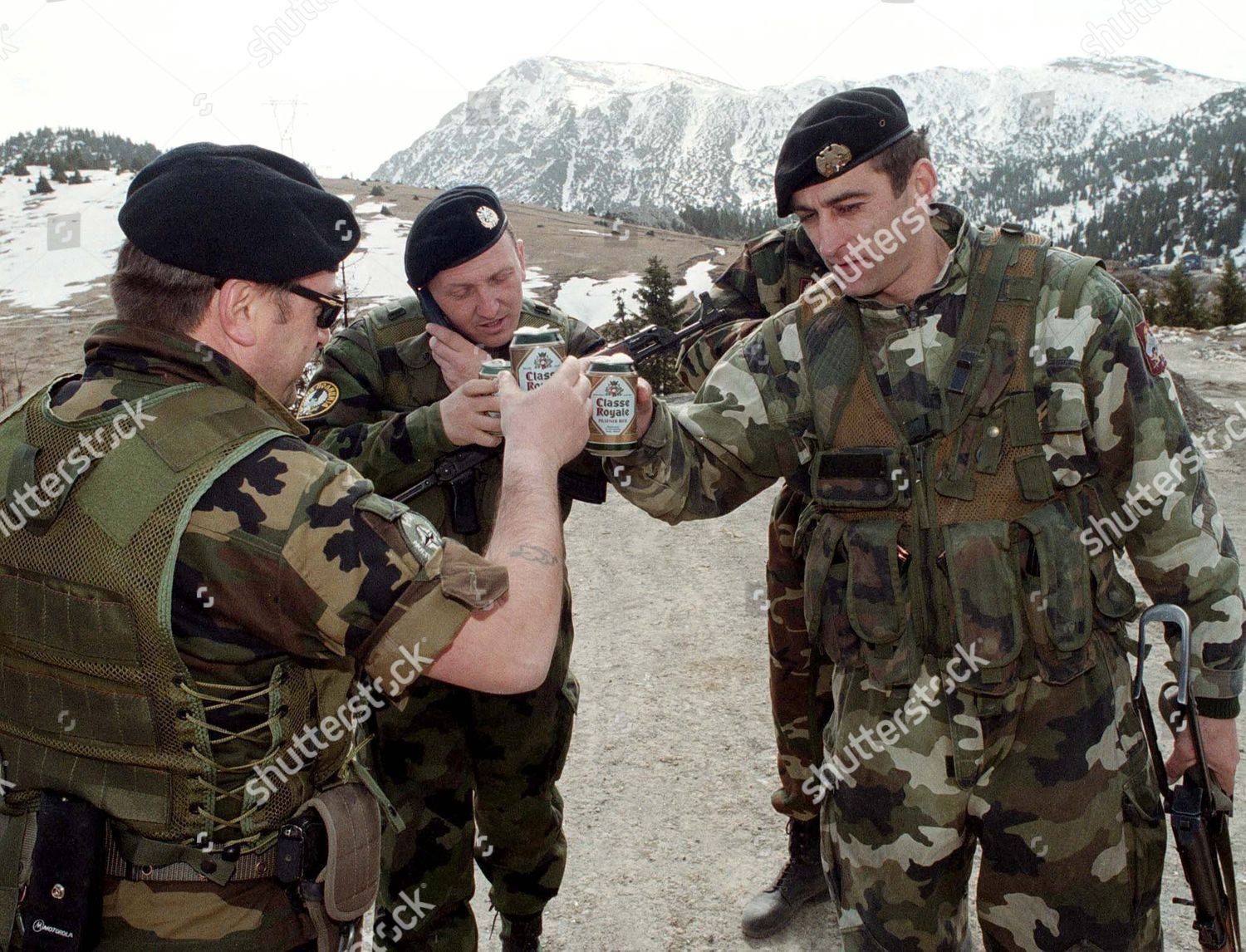 yugoslavia-kosovo-troops-enter-mar-2001-shutterstock-editorial-7705488a.jpg