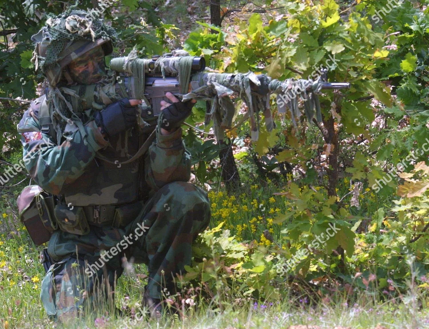 yugoslavia-sniper-may-2001-shutterstock-editorial-7743089a.webp