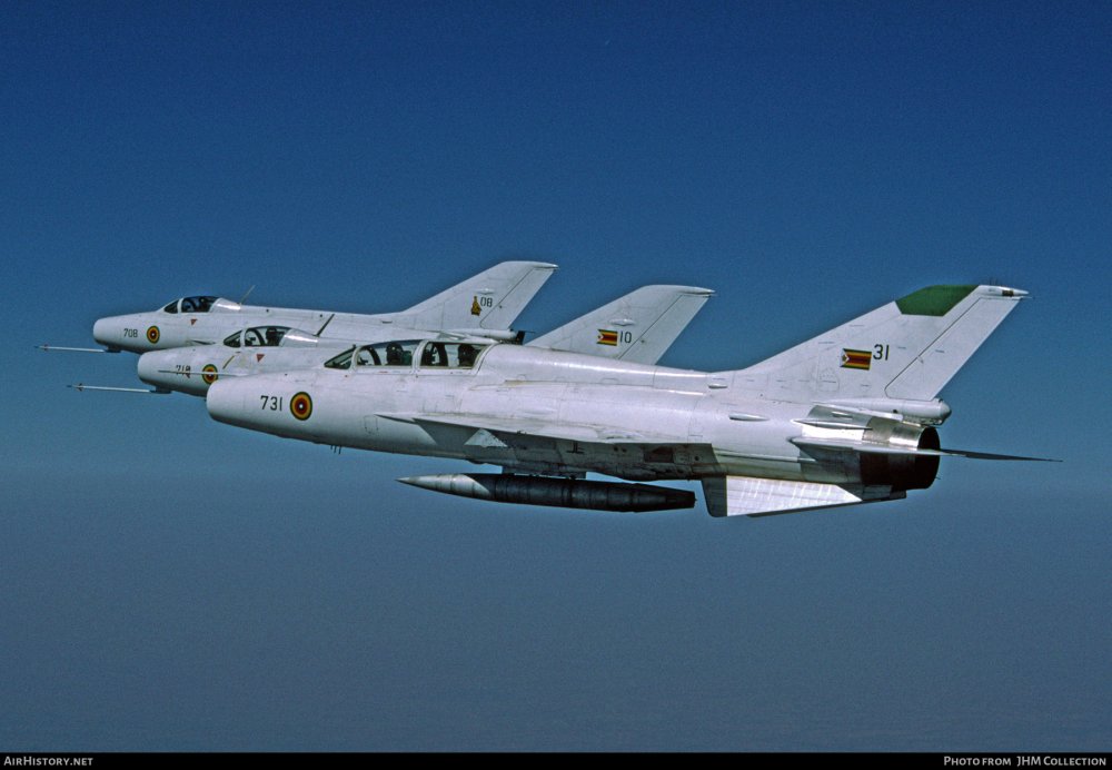Zimbabwe FT-7BZ (731) & F-7 (710 & 708) of 5 Sqn inflight over their country (October 1996).jpg