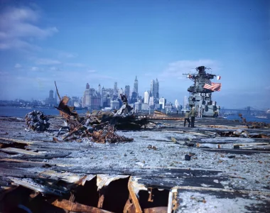 USS Franklin (CV-13) approaches Manhattan as it prepares to dock at the Brooklyn Navy Yard on...webp