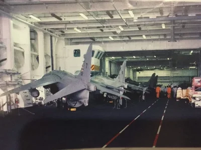 Thai Navy AV-8S (3107, 3106 & 2 more) in hangar.jpg