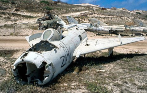 Somali F-6C (423~) abandoned at Mogadishu.jpg