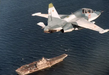 Russian Navy Su-25UTG (15 red) over Admiral Kuznetsov.jpg