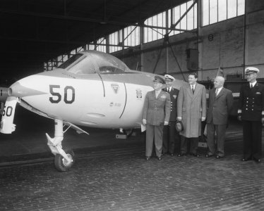 Netherland Navy Sea Hawk FGA.50 at Valkenburg NAB with US delegation (18 September 1957).jpg