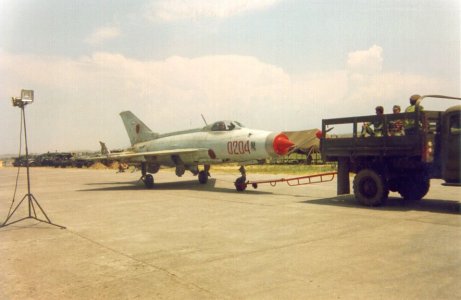 Albanian J-7 (0204 red) being towed out..jpg
