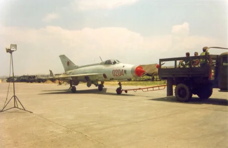 Albanian J-7 (0204 red) being towed out..webp