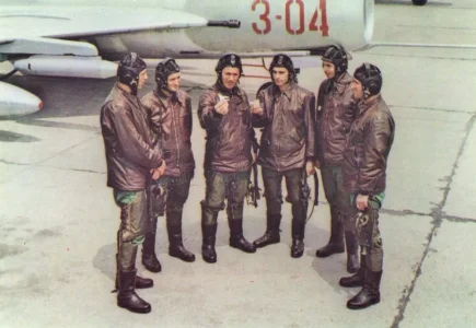 Albanian F-6 (3-04 red) with pilots.webp
