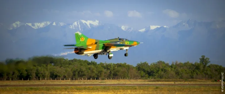 Kazakhstan MiG-23UB (62 yellow) taking-off from Zhetygen AB (1).webp