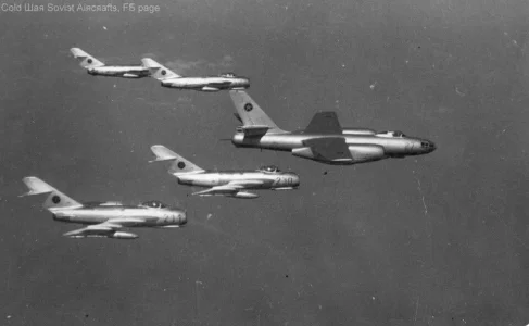 Albanian F-5 (211, 230 red & more) with H-5 (27) inflight.webp