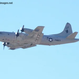 Navy P-3C Orion aircraft flies by during a check flight