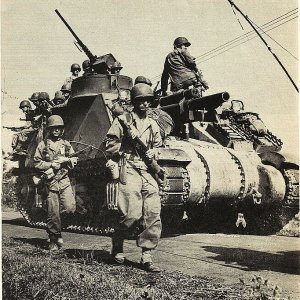105-MM Gun Motor Carriage M7 and infantry
