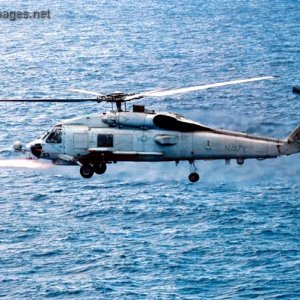 SH-60B Seahawk fires an AGM-114 Hellfire