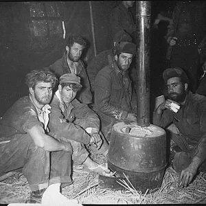 Former American And Australian Prisoners Of War Warming Up A