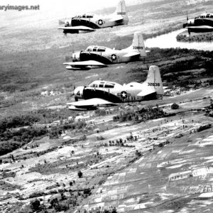 A-1E Skyraider aircraft fly in formation