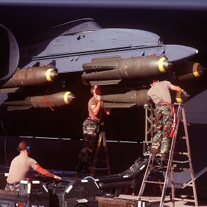 Loading Mark 117 750-lb. bombs on a B-52