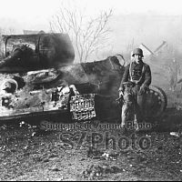Germans pose with T-34/85 which they took out earlier, WW2
